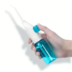 Portable water flosser for travel, lightweight design, blue reservoir