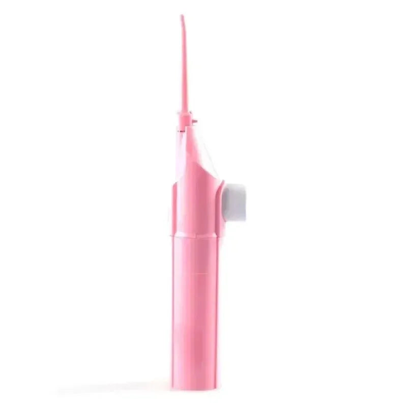 Pink portable water flosser for travel with compact design