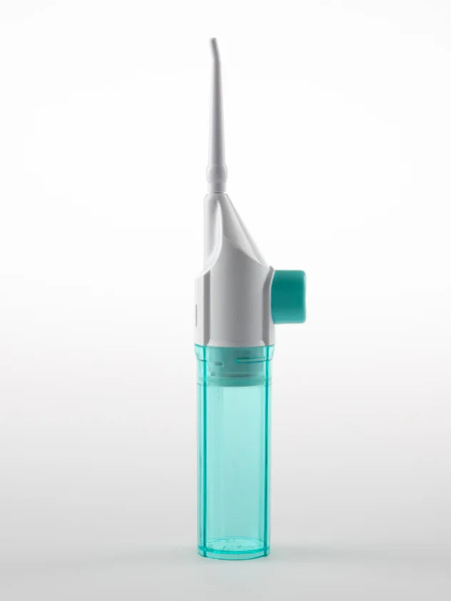 Portable water flosser for travel, teal and white, compact design