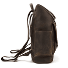 Side view of a premium leather backpack with a sturdy design and adjustable straps