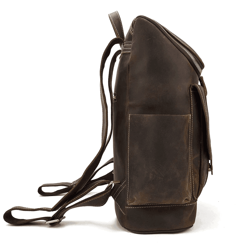 Side view of a premium leather backpack with a sturdy design and adjustable straps