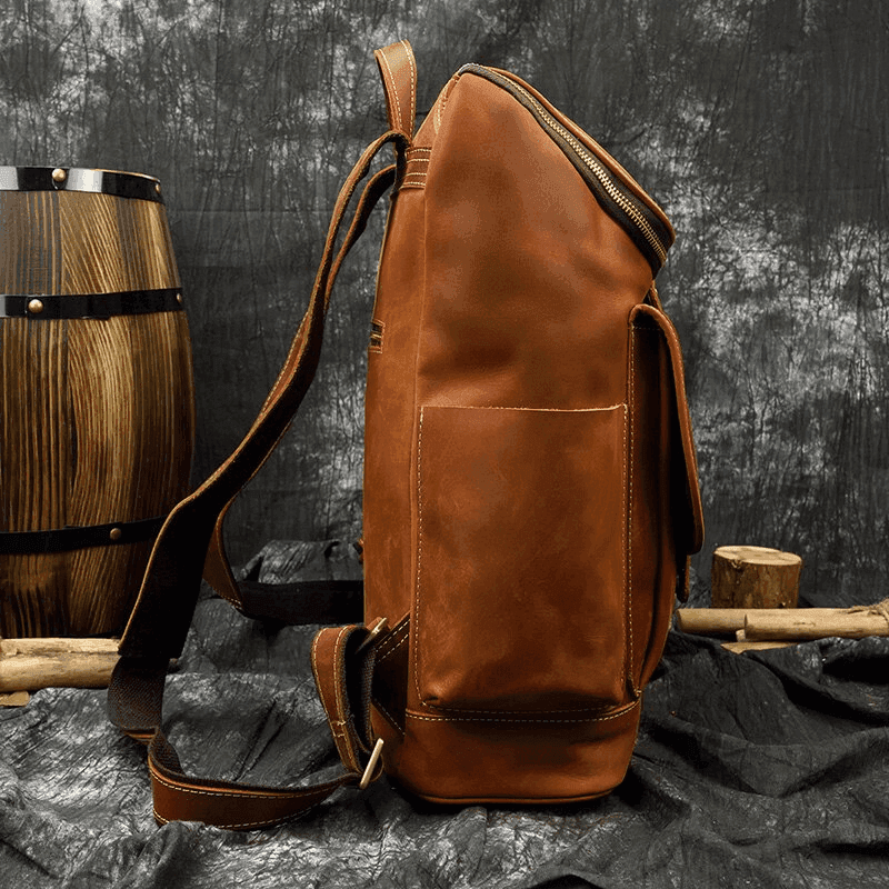 Stylish premium leather backpack with side pocket and durable design for everyday use
