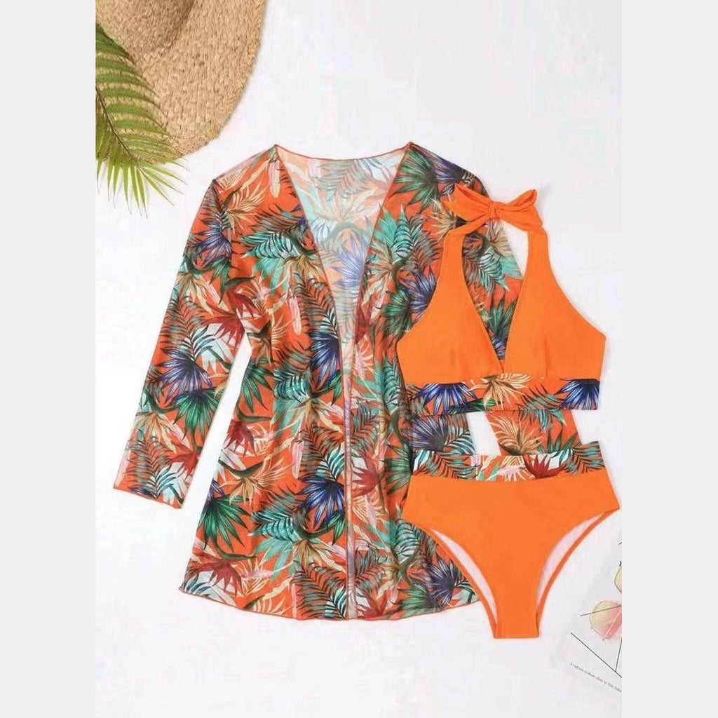 Women's printed halter neck swim set in vibrant colors, perfect for beach days
