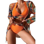 Women's printed halter neck swim set in orange, perfect for the beach