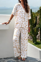 VacationGrabs women's printed short sleeve pants set featuring beige abstract patterns on white fabric