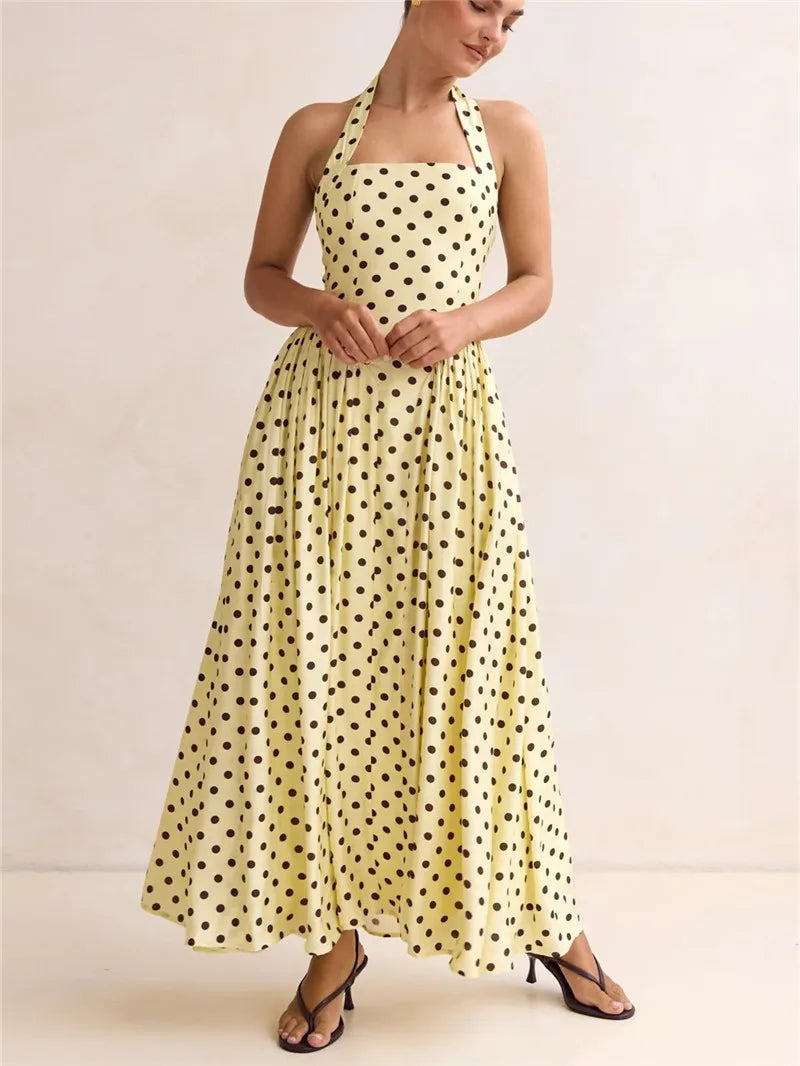 Women's yellow polka dot halter maxi dress for summer outings