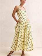 Women's yellow polka dot halter neck and maxi dress for summer outings