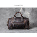 Brown leather duffel bag by VacationGrabs, perfect as a professional business travel bag