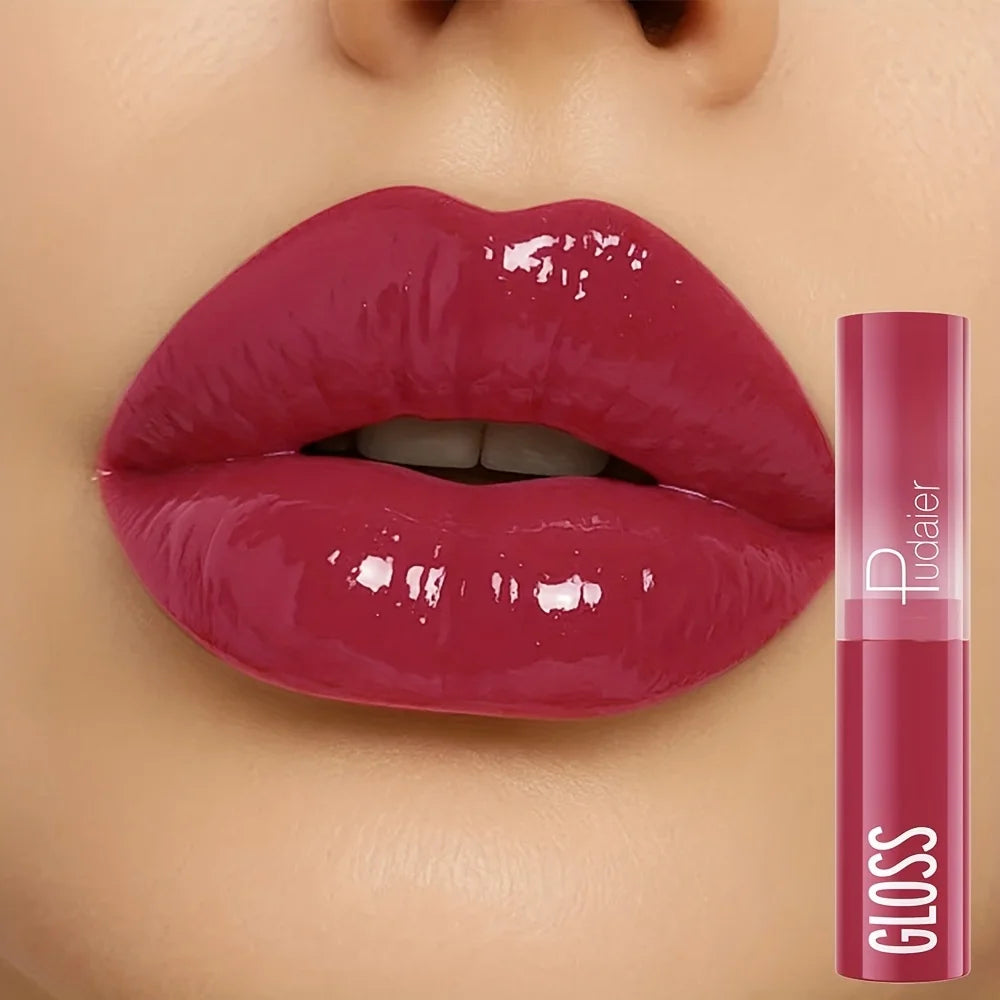Pudraer lip gloss in deep berry shade, perfect for a glossy finish
