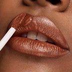 VacationGrabs lip gloss glitter lips in shimmering bronze for a dazzling look