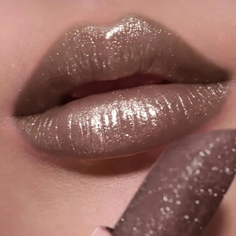 Pearlescent lipstick in shimmering nude shade for glamorous looks
