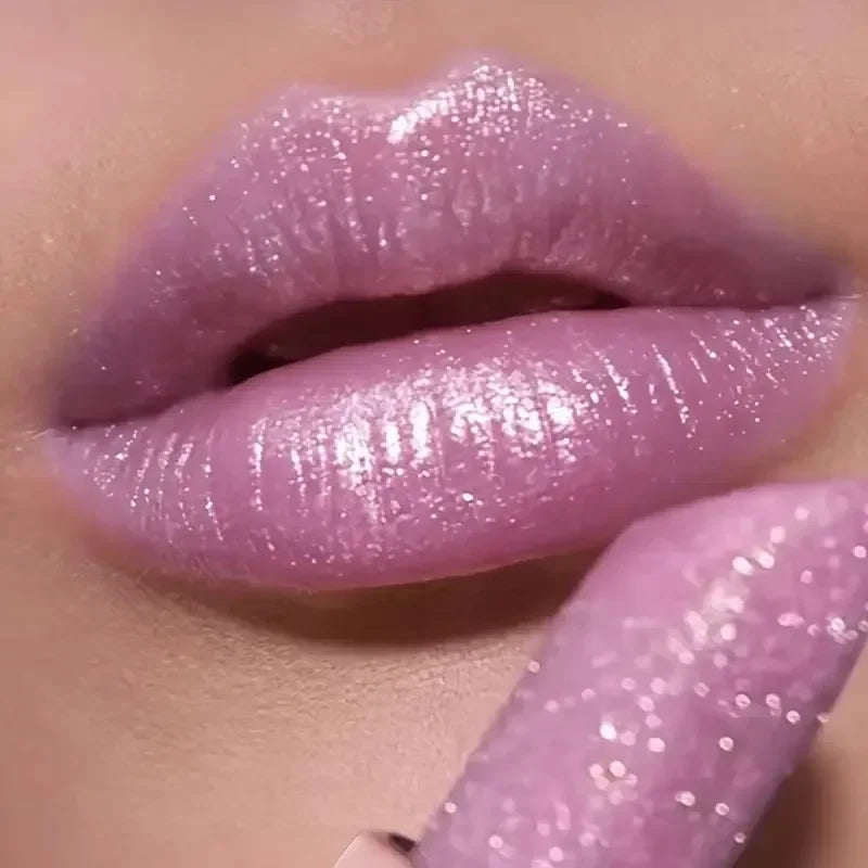 Pearlescent lipstick in soft pink shade for a glossy finish