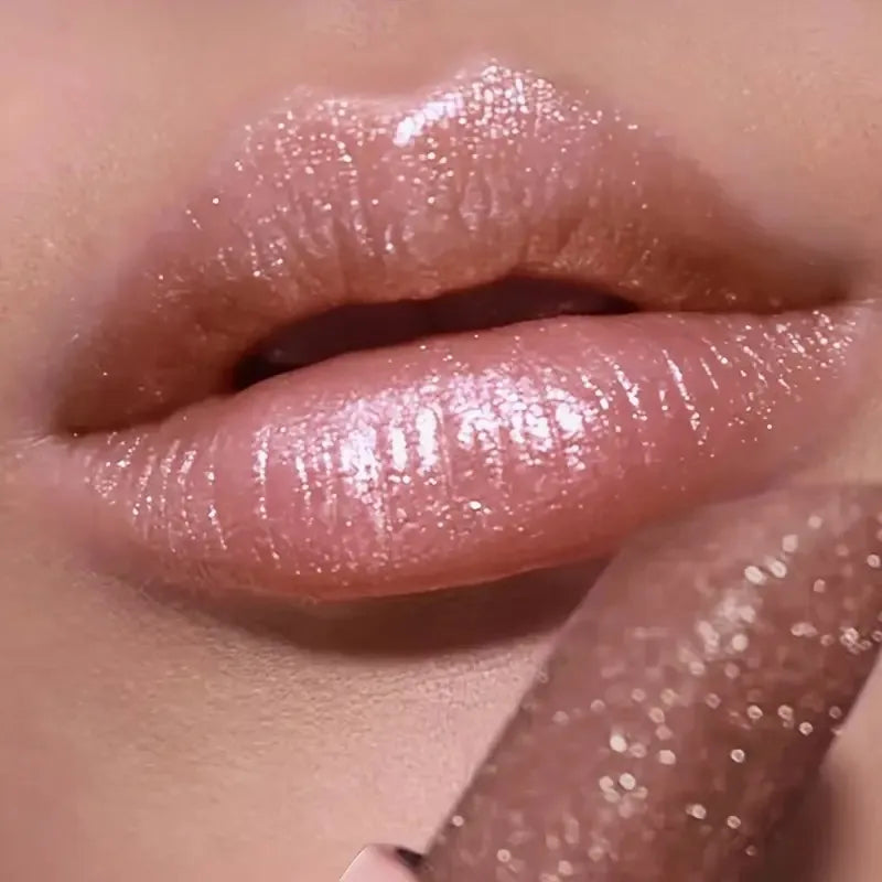 VacationGrabs pearlescent lipstick in soft pink for a shimmering finish