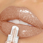 VacationGrabs lip gloss in shimmering nude for a dazzling finish