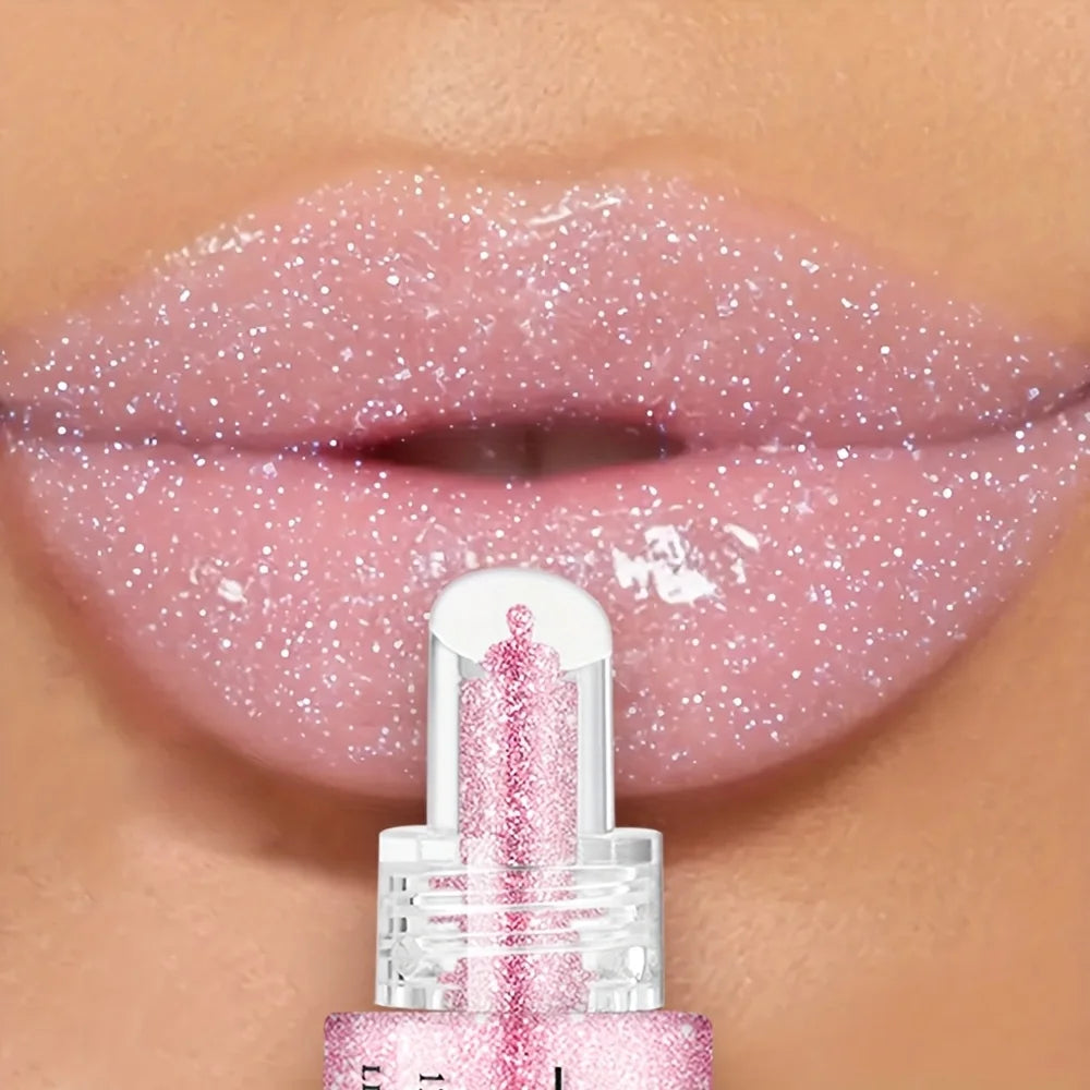 VacationGrabs lip gloss in sparkling pink for a shiny finish