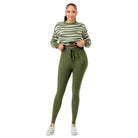Chic pullover sweater and pant set for women in green striped design, perfect for casual wear