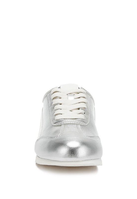 Women's metallic lace-up sneakers in shiny silver for casual wear