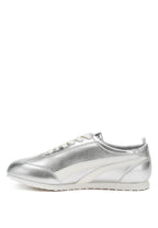 Women's metallic lace-up sneakers in shiny silver for casual wear