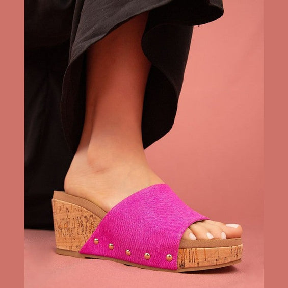 Leather wedge sandals for women in pink with cork platform and studded details
