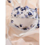 Women's floral push up bra in white and blue lace, perfect for everyday wear
