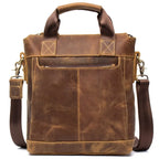 Brown leather travel bag, durable material for stylish traveling