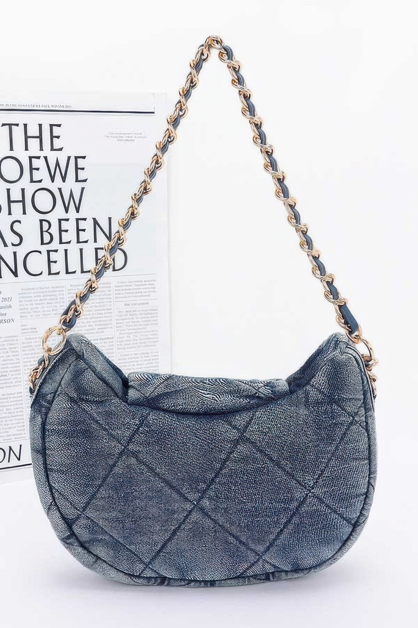 Quilted denim crossbody bag with a chic gold chain strap for stylish everyday use