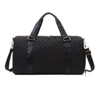 Aili's Corner quilted weekender bag for women in black with durable handles and adjustable strap