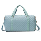Aili's Corner quilted weekender bag for women in light blue with sturdy handles and adjustable strap