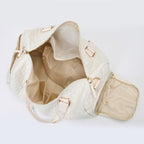 Aili's Corner quilted weekender bag for women in cream color with spacious interior and zippered compartments
