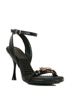 Elegant black strappy heels from Rag Company with stylish ankle strap and unique design
