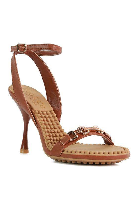 Stylish black strappy heels with a sleek design and comfortable sole perfect for fashionable occasions
