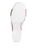 Bottom view of chunky heel raffia sandals from Rag Company showing the white sole and heel