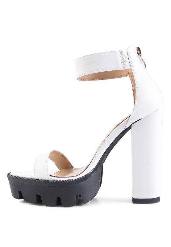 Stylish women's heels with a chunky heel design and a rattle snake pattern shoes for a trendy look