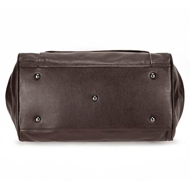 Bottom view of real leather travel bags by VacationGrabs with sturdy metal feet for durability