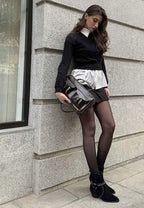 Rag Company women's real suede leather western boots styled with black outfit against a city backdrop