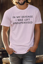 Pink novelty coworker tee featuring the phrase 'In My Defense I Was Left Unsupervised' for casual wear