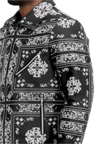 WEIV red bandana leather jacket featuring intricate black and white patterns and stylish zippered pockets