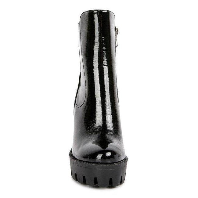 Women's black patent leather boots, perfect for stylish outfits