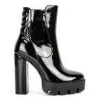 Women's black patent leather high heel boots for stylish outfits
