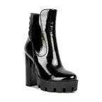 Women's black shiny high heel boots for fashionable outings