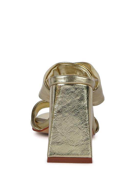 Stylish gold women's heels with a block heel design perfect for pairing with red high heeled sandals