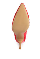 Red knitted stiletto ankle boots with a sleek design and pointed toe for a stylish look