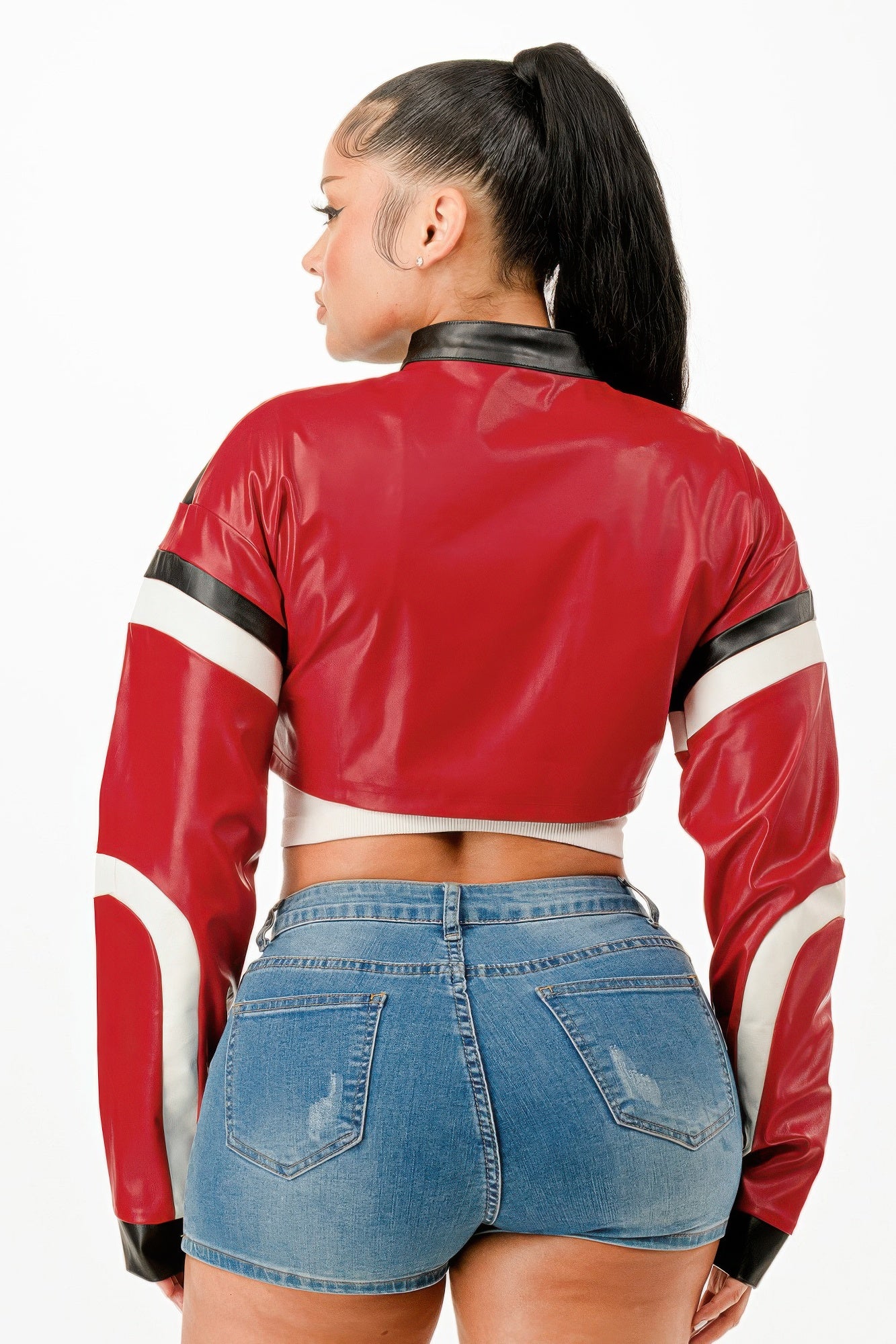 Stylish red leather cropped biker jacket with contrasting black and white details for a bold look