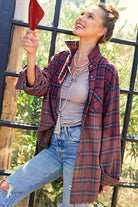 La Miel red plaid casual shirt styled with jeans and layered over a top for a relaxed look