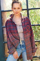 La Miel red plaid casual shirt styled with a basic top and jeans in a bright outdoor setting