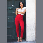 VacationGrabs red tapered ankle pants women styled with white lace blouse and heels