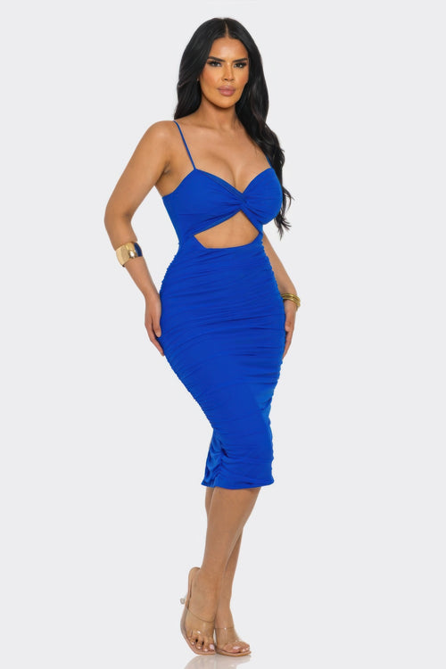 Blue bodycon dress with cut-out design, perfect for evening events