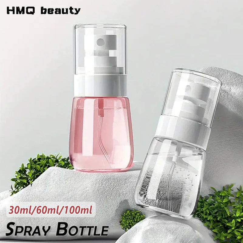 refillable mini fine mist spray bottle for travel-size liquids (photo 1 of 9)