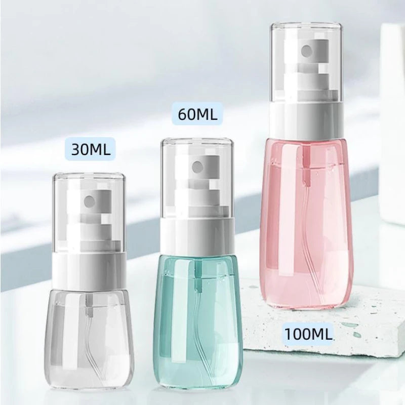 refillable mini fine mist spray bottle for travel-size liquids (photo 2 of 9)