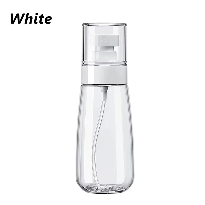 refillable mini fine mist spray bottle for travel-size liquids (photo 8 of 9)
